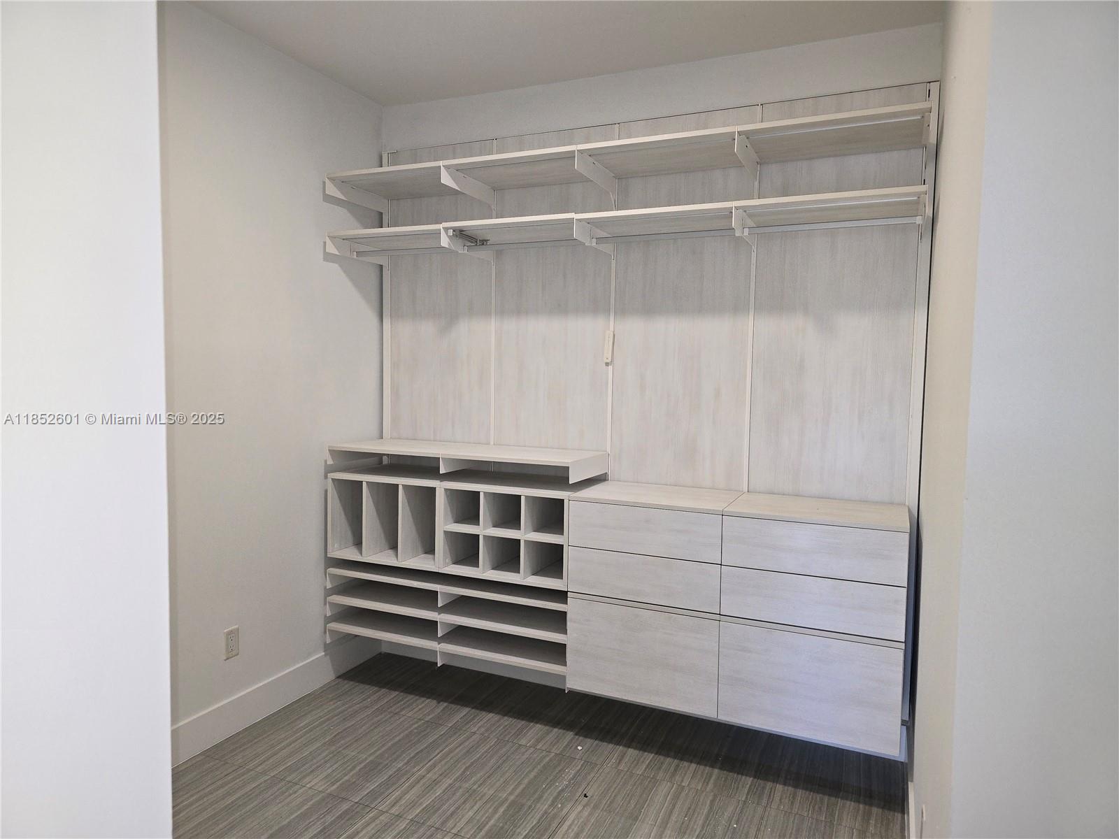 2960 Northeast 207th Street, Unit 713 Aventura, FL 33180 - Photo 25 of 33 a view of walk in closet