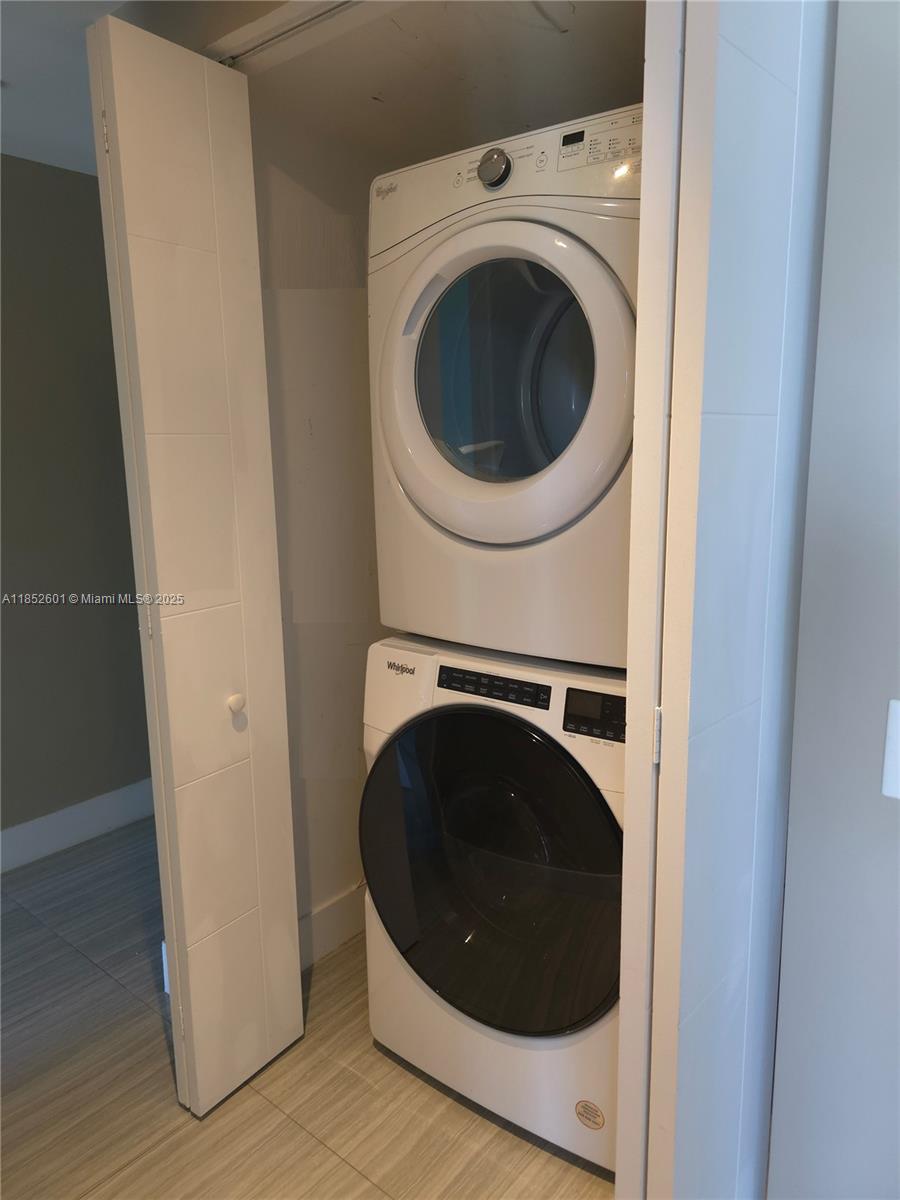 2960 Northeast 207th Street, Unit 713 Aventura, FL 33180 - Photo 27 of 33 a close up view of a washer and dryer