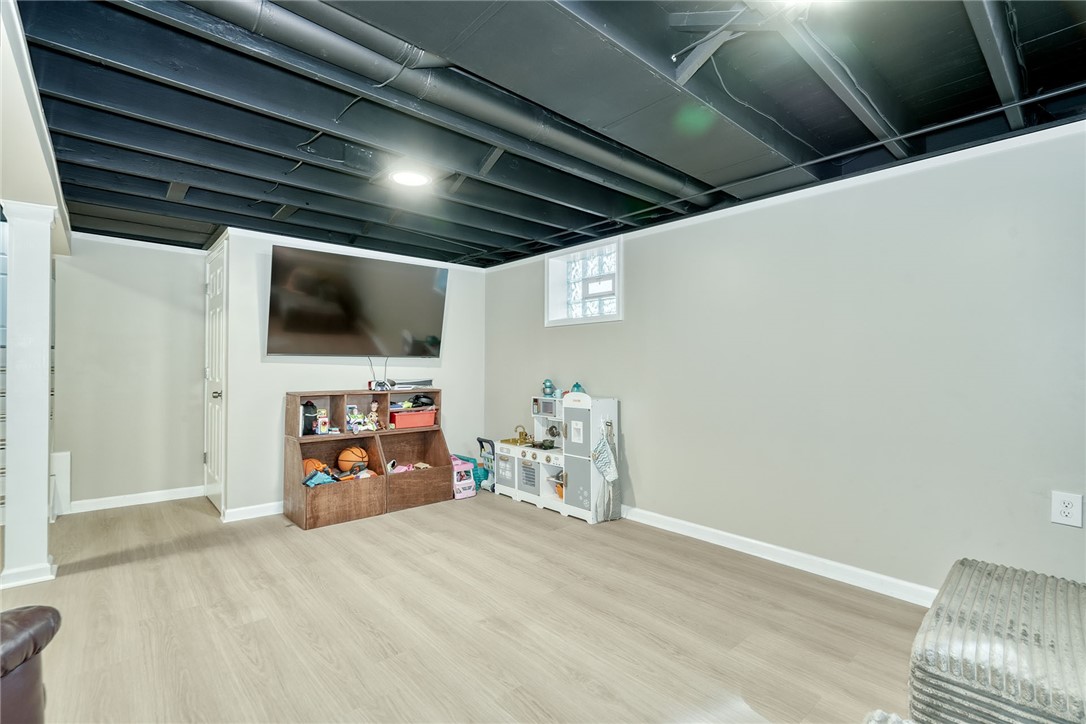 1038 Whalen Road Penfield, NY 14526 - Photo 33 of 46 Finished lower level basement space!