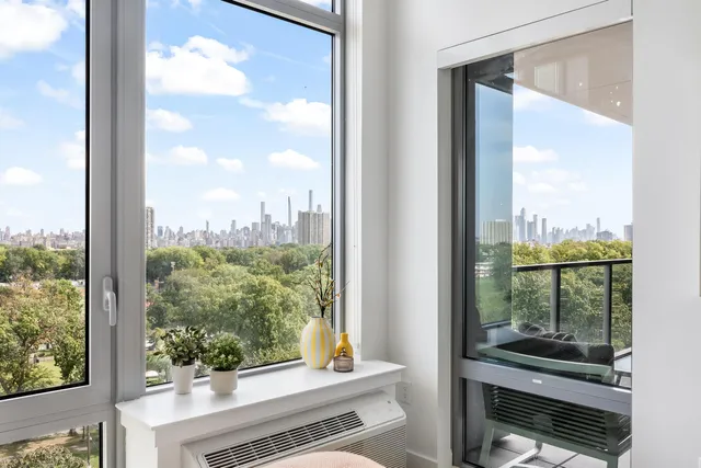 a view of a glass door and a window
