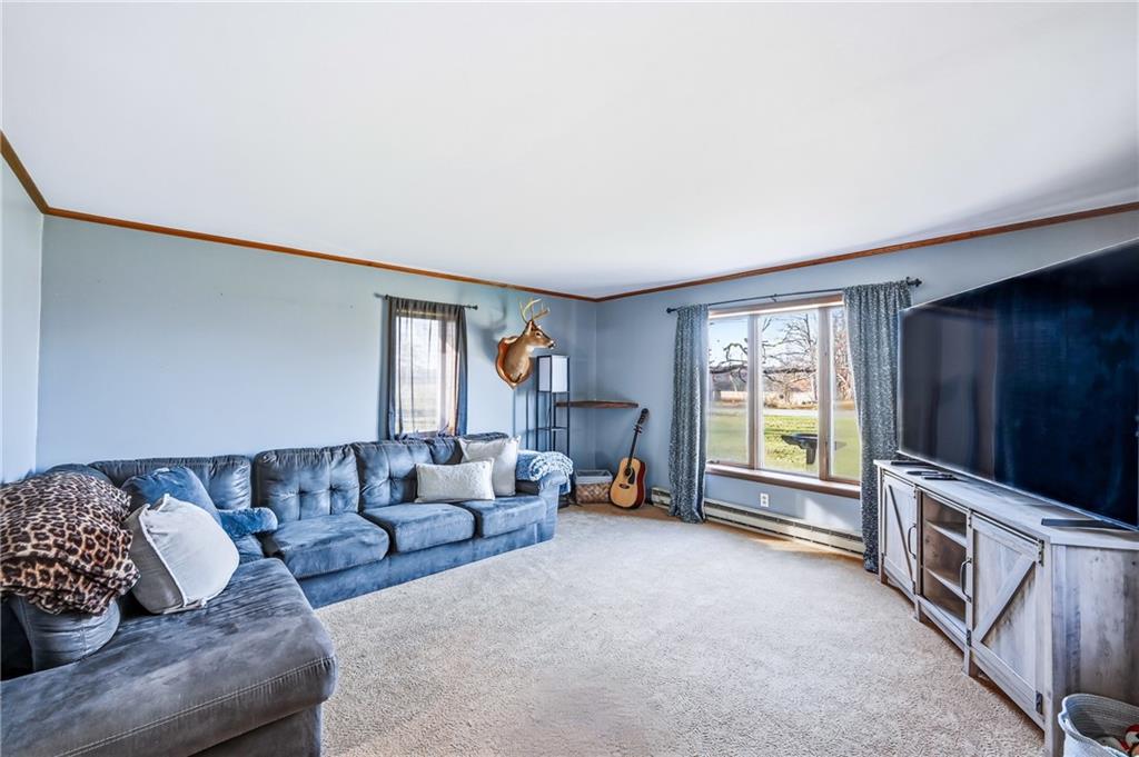 133 North Good Hope Road Greenville, PA 16125 - Photo 12 of 50 a living room with furniture and a flat screen tv
