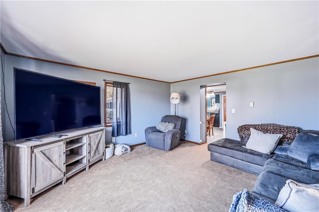 133 North Good Hope Road Greenville, PA 16125 - Photo 13 of 50 a living room with furniture and a flat screen tv