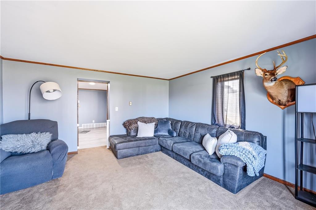 133 North Good Hope Road Greenville, PA 16125 - Photo 14 of 50 a living room with furniture and stairs