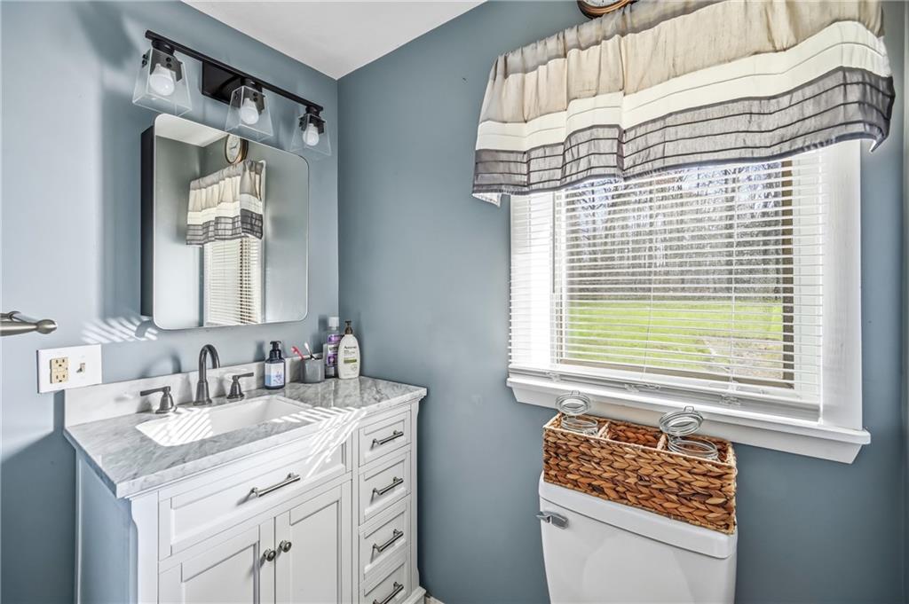 133 North Good Hope Road Greenville, PA 16125 - Photo 19 of 50 a bathroom with a sink a toilet and a mirror