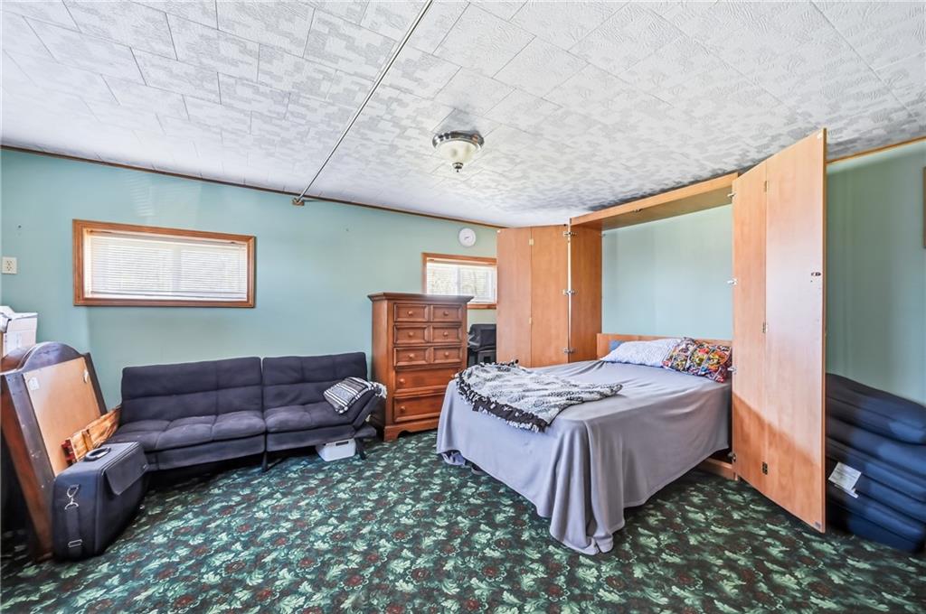 133 North Good Hope Road Greenville, PA 16125 - Photo 29 of 50 a living room with a bed couch and a dresser