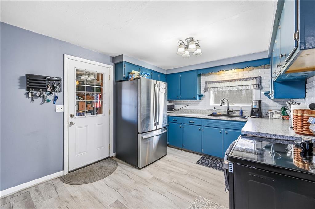 133 North Good Hope Road Greenville, PA 16125 - Photo 3 of 50 a kitchen with stainless steel appliances granite countertop a refrigerator sink and stove