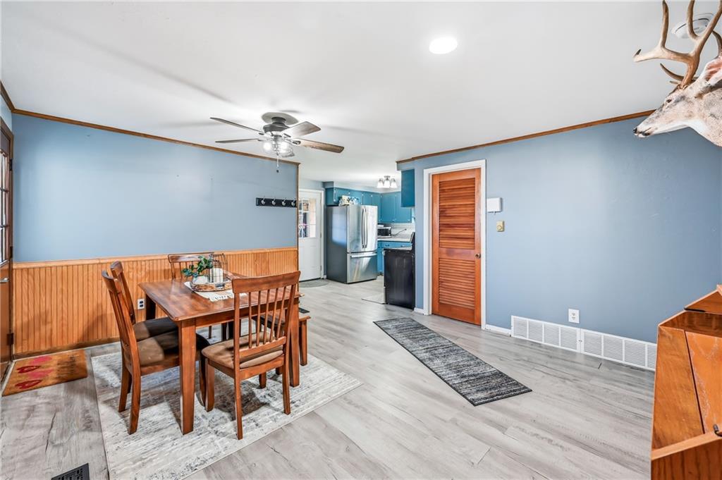 133 North Good Hope Road Greenville, PA 16125 - Photo 9 of 50 a view of a livingroom with furniture and a ceiling fan