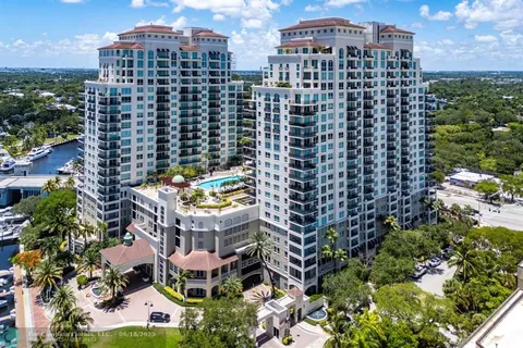 an aerial view of a city with tall buildings