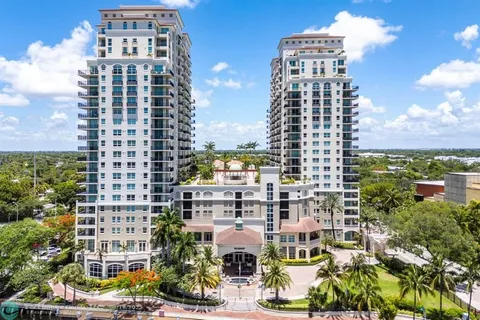 a view of a city with tall buildings