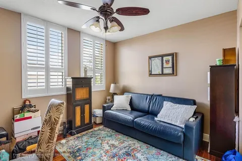 a view of balcony with furniture