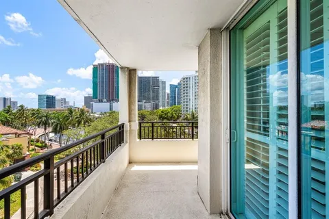 a view of a city with tall buildings