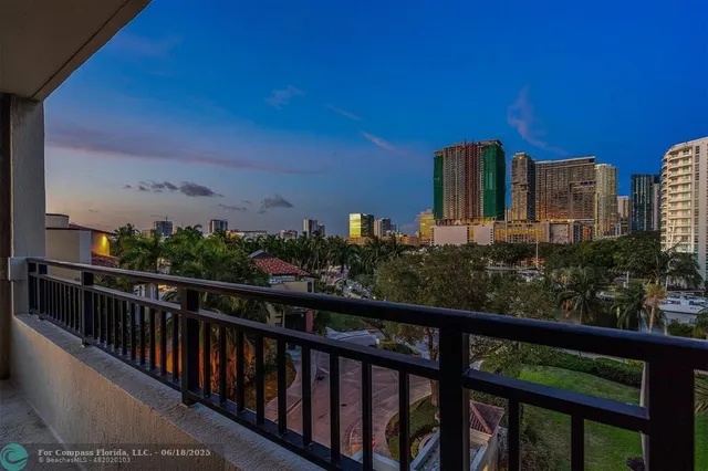 a living room with furniture and a large mirror