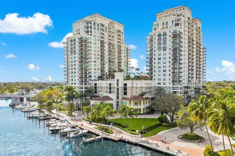 a sign that is sitting on a brick wall