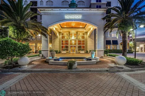 a view of a street with sitting area