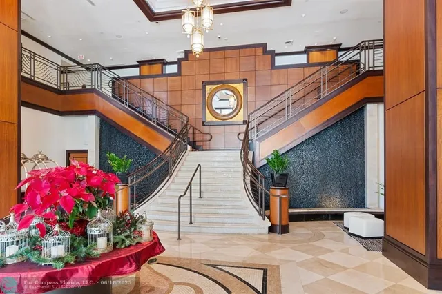 a roof deck with table and chairs