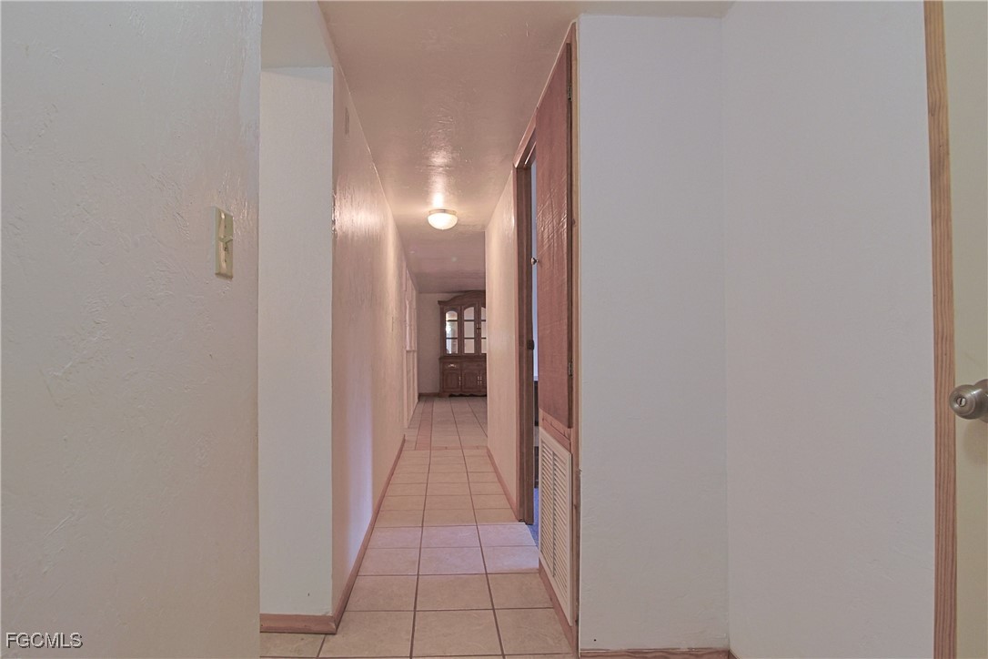 6620 Golden Road North Fort Myers, FL 33917 - Photo 23 of 26 a view of a hallway with a white walls