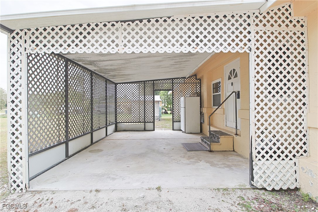 6620 Golden Road North Fort Myers, FL 33917 - Photo 5 of 26 a view of a wooden fence