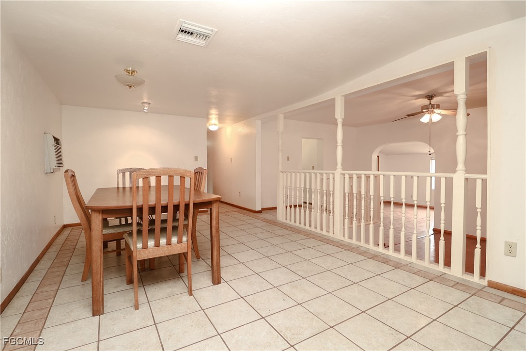 6620 Golden Road North Fort Myers, FL 33917 - Photo 9 of 26 a view of a dining room with furniture