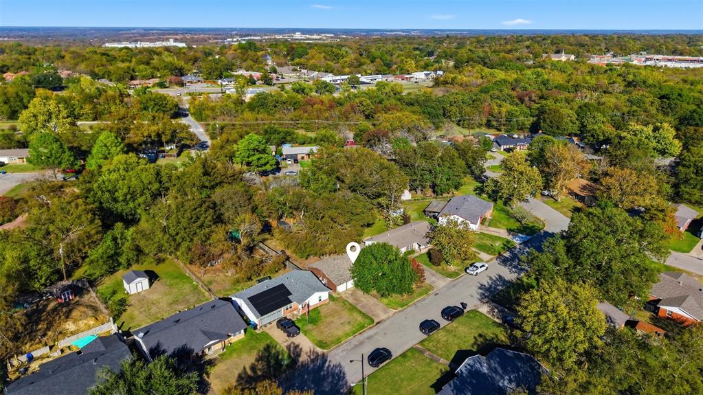 145 Bob White Road Denison, TX 75020 - Photo 17 of 24 an aerial view of residential houses with outdoor space