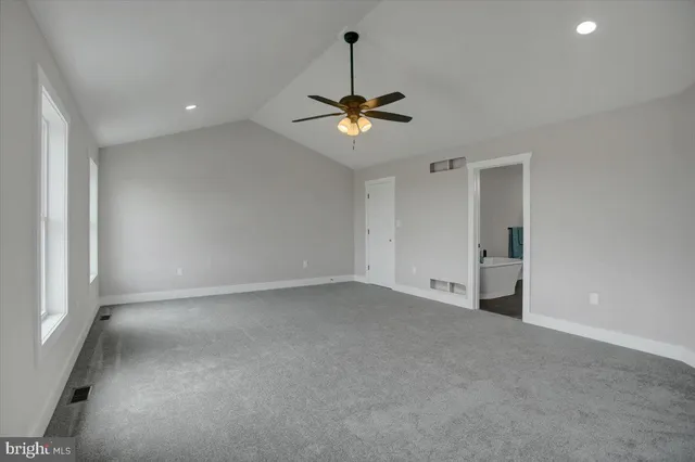 a view of a chandelier fan in a room