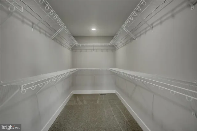 a view of a room with racks on the wall