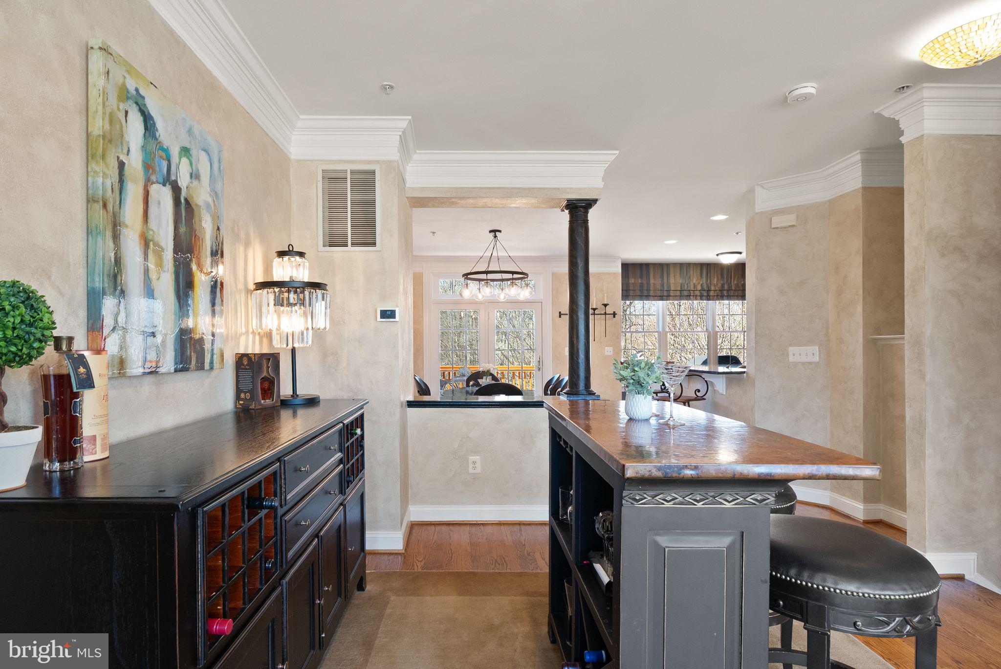 4132 Timber Log Way Fairfax, VA 22030 - Photo 17 of 69 a kitchen with stainless steel appliances granite countertop a sink stove and refrigerator