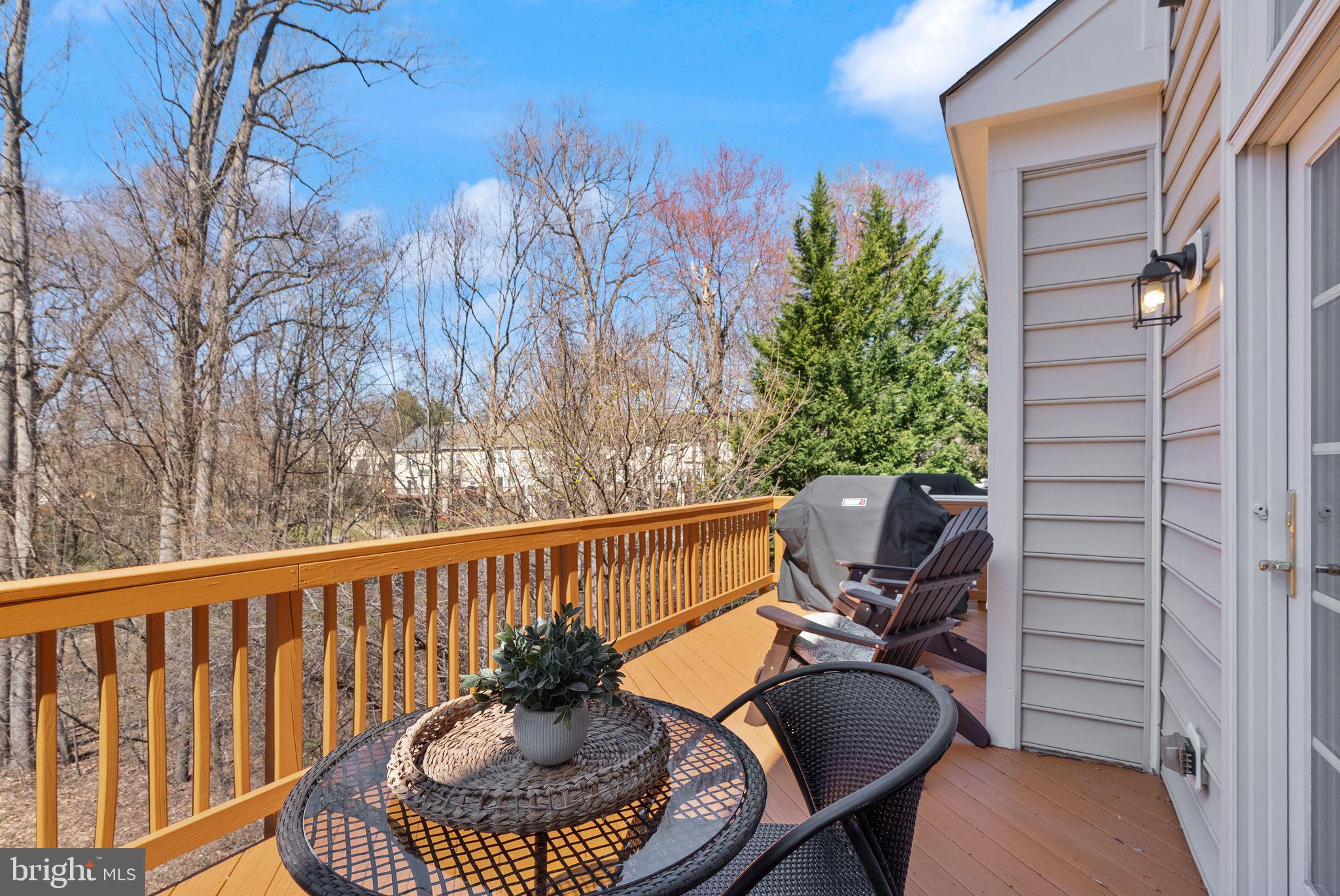 4132 Timber Log Way Fairfax, VA 22030 - Photo 32 of 69 a view of balcony with chair and potted plant