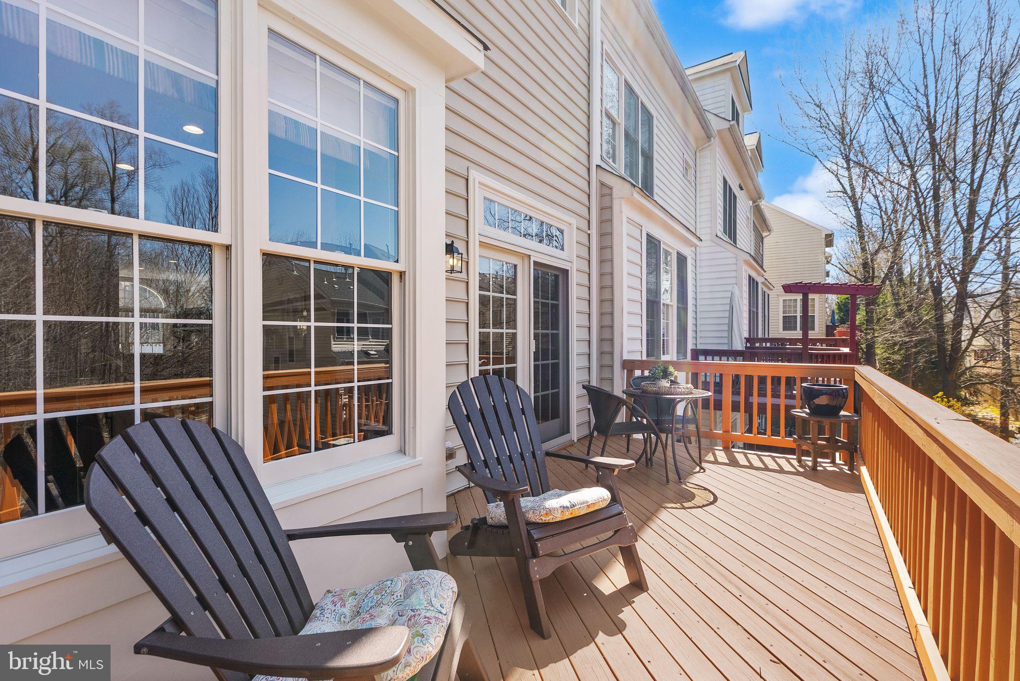 4132 Timber Log Way Fairfax, VA 22030 - Photo 33 of 69 a balcony with table and chairs