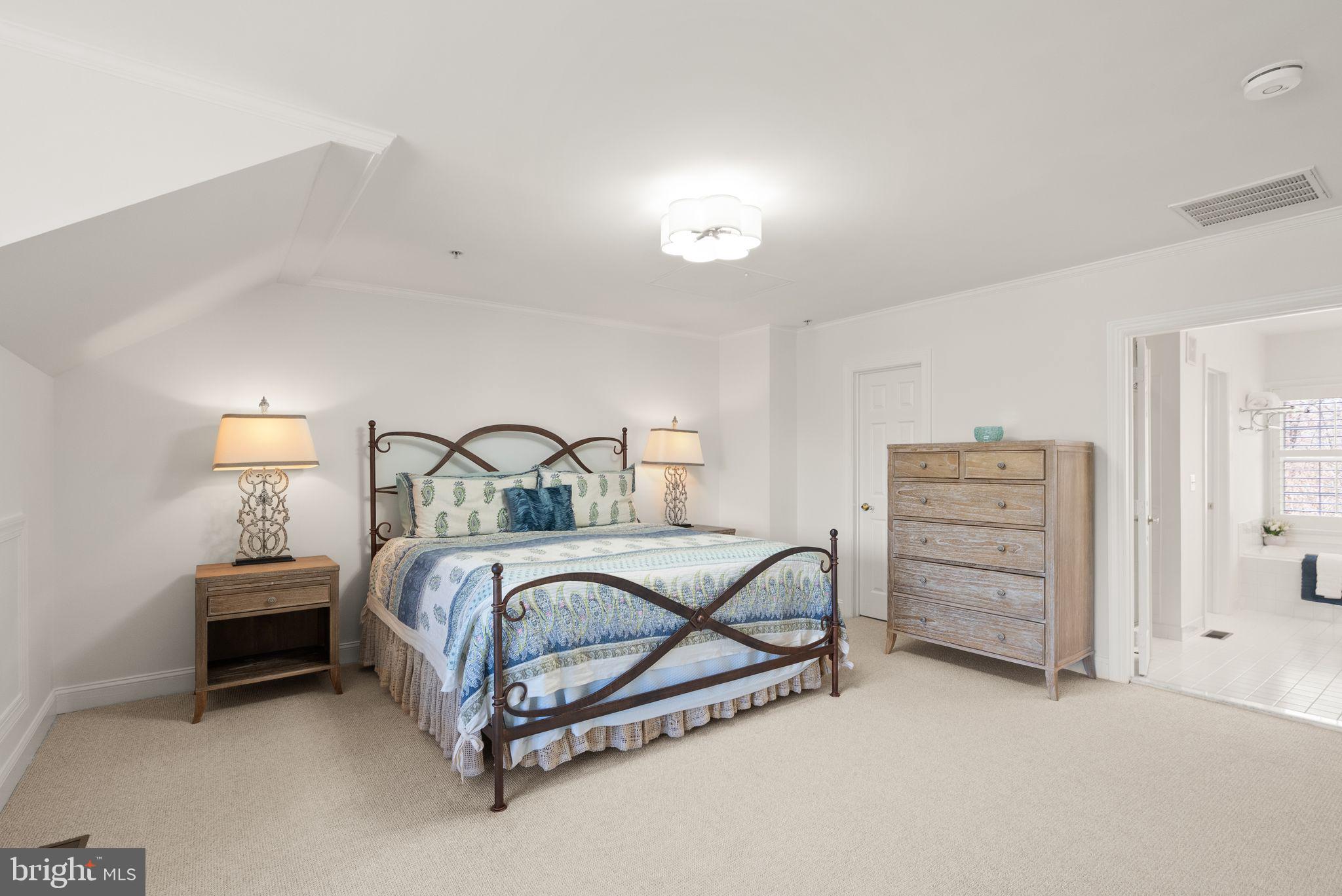 4132 Timber Log Way Fairfax, VA 22030 - Photo 47 of 69 a bedroom with a bed and a table
