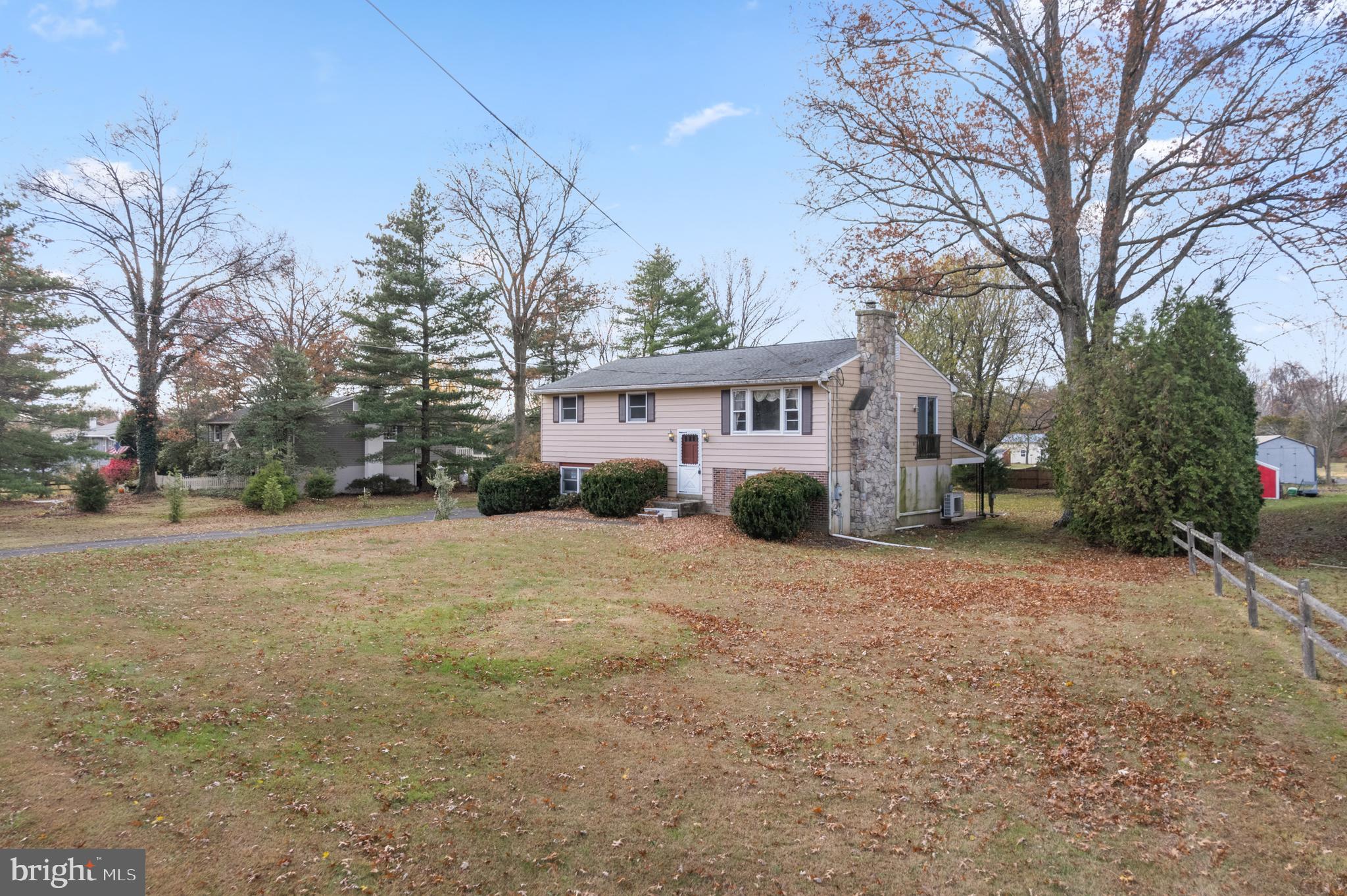 2814 Upper Ridge Road Pennsburg, PA 18073 - Photo 3 of 45 a view of a house with a yard and garage