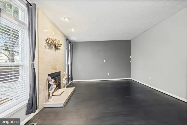 a view of a livingroom with a fireplace