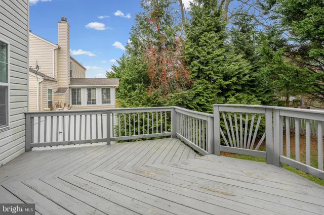a view of a wooden roof deck