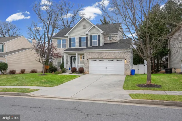 a picture of a bathroom with a sink and a mirror