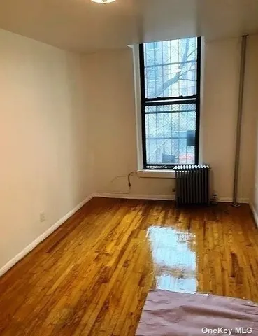 a view of an empty room and window