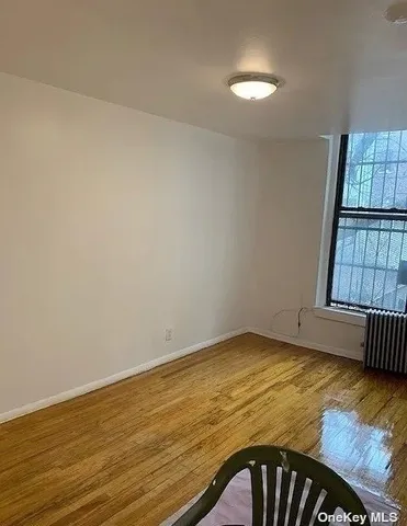 a white refrigerator freezer and a stove sitting inside of a kitchen