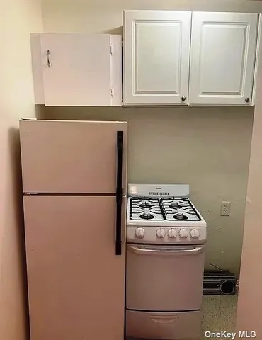 a bathroom with a sink toilet and vanity