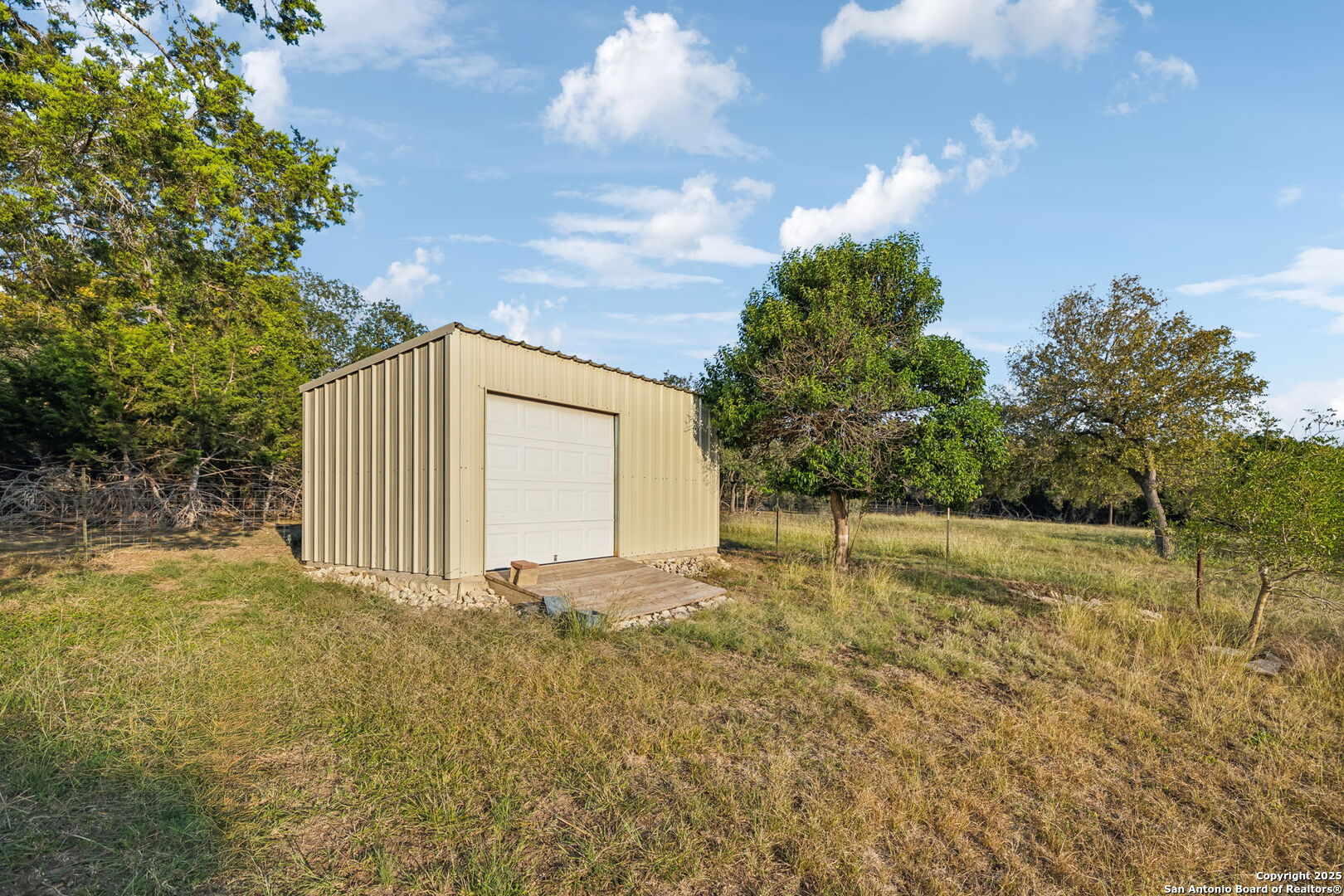 232 Stoneleigh Road Center Point, TX 78010 - Photo 24 of 34 a view of a yard with large trees