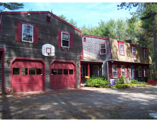 63 Carver Road Wareham, MA 02576 - Photo 1 of 1 a front view of house with yard