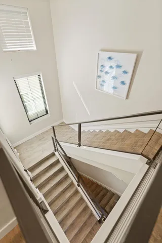 a living room with furniture a fireplace and a table