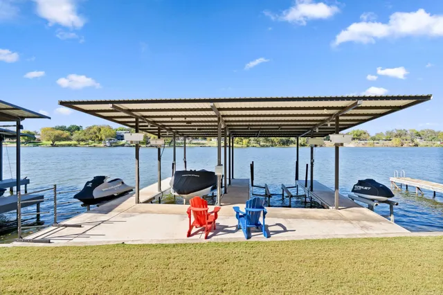 an aerial view of a houses with outdoor space