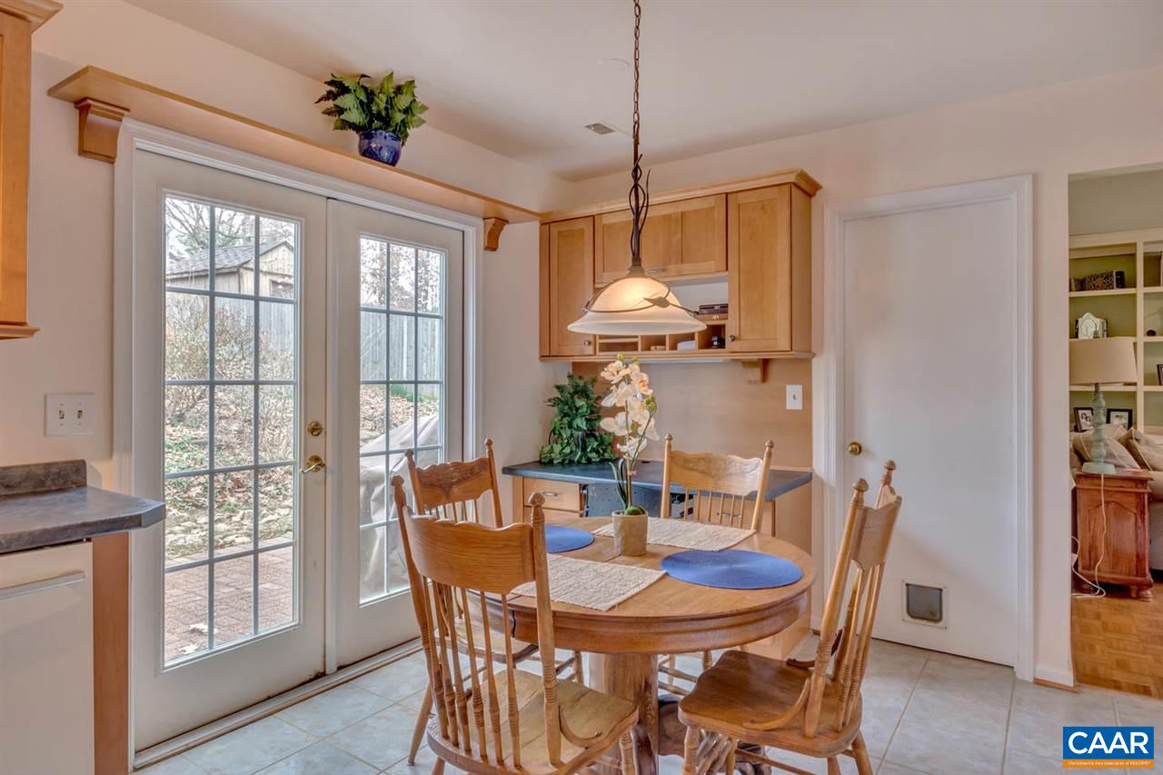 321 North Bennington Road Charlottesville, VA 22901 - Photo 13 of 30 a view of a dining room with furniture window and wooden floor