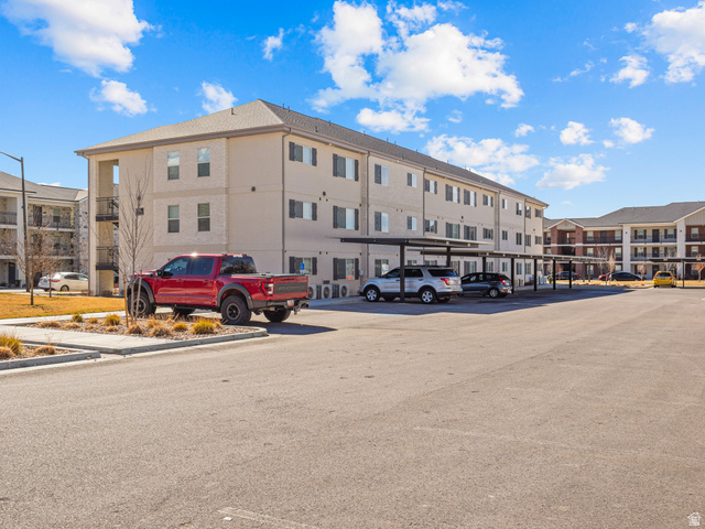 64 West 600 South, Unit C301 Springville, UT 84663 - Photo 39 of 40 View of apartment building / complex featuring uncovered parking