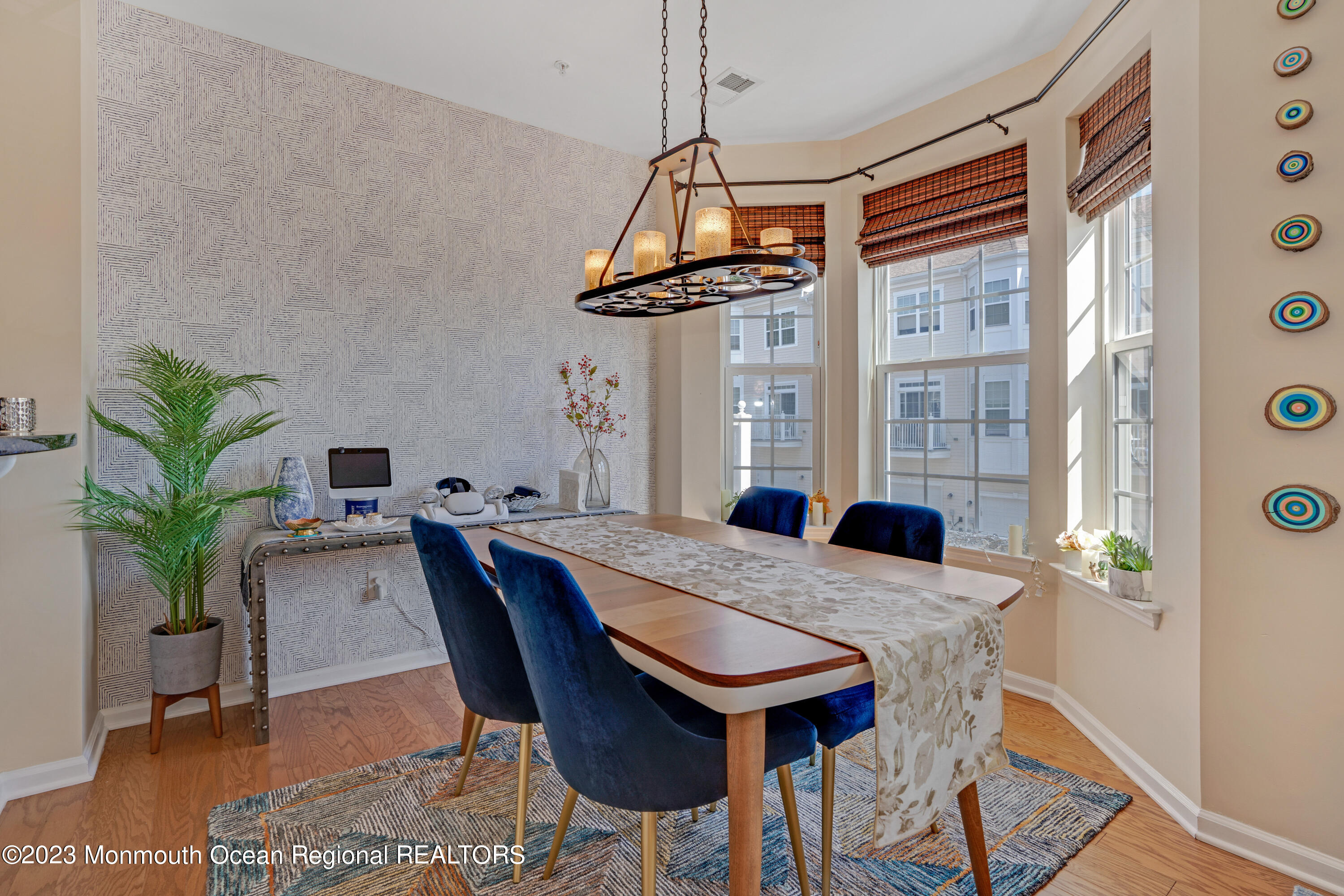 7 Iris Lane, Unit 504 Garfield, NJ 07026 - Photo 11 of 31 a view of a dining room with furniture window and wooden floor