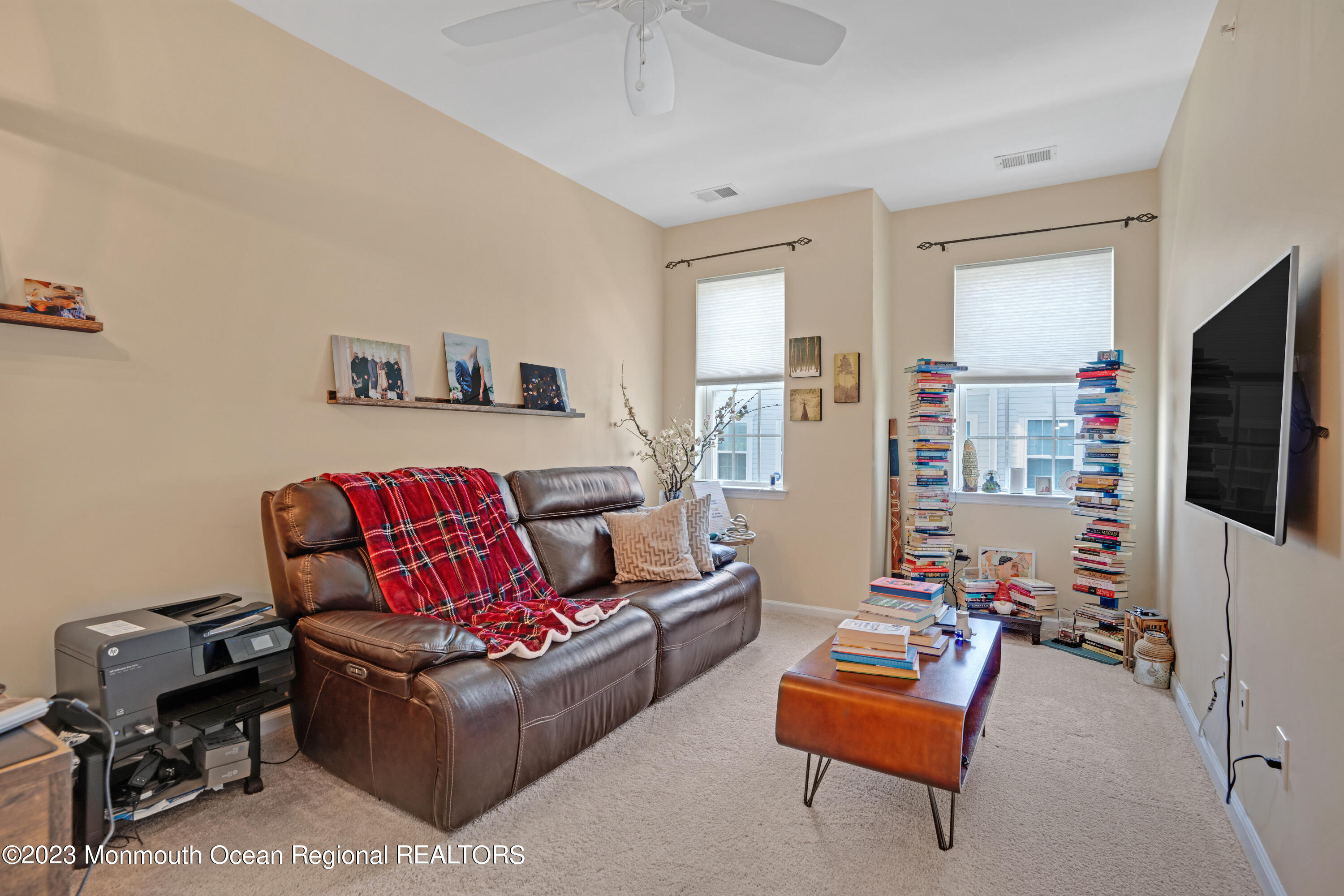 7 Iris Lane, Unit 504 Garfield, NJ 07026 - Photo 16 of 31 a living room with furniture and a flat screen tv