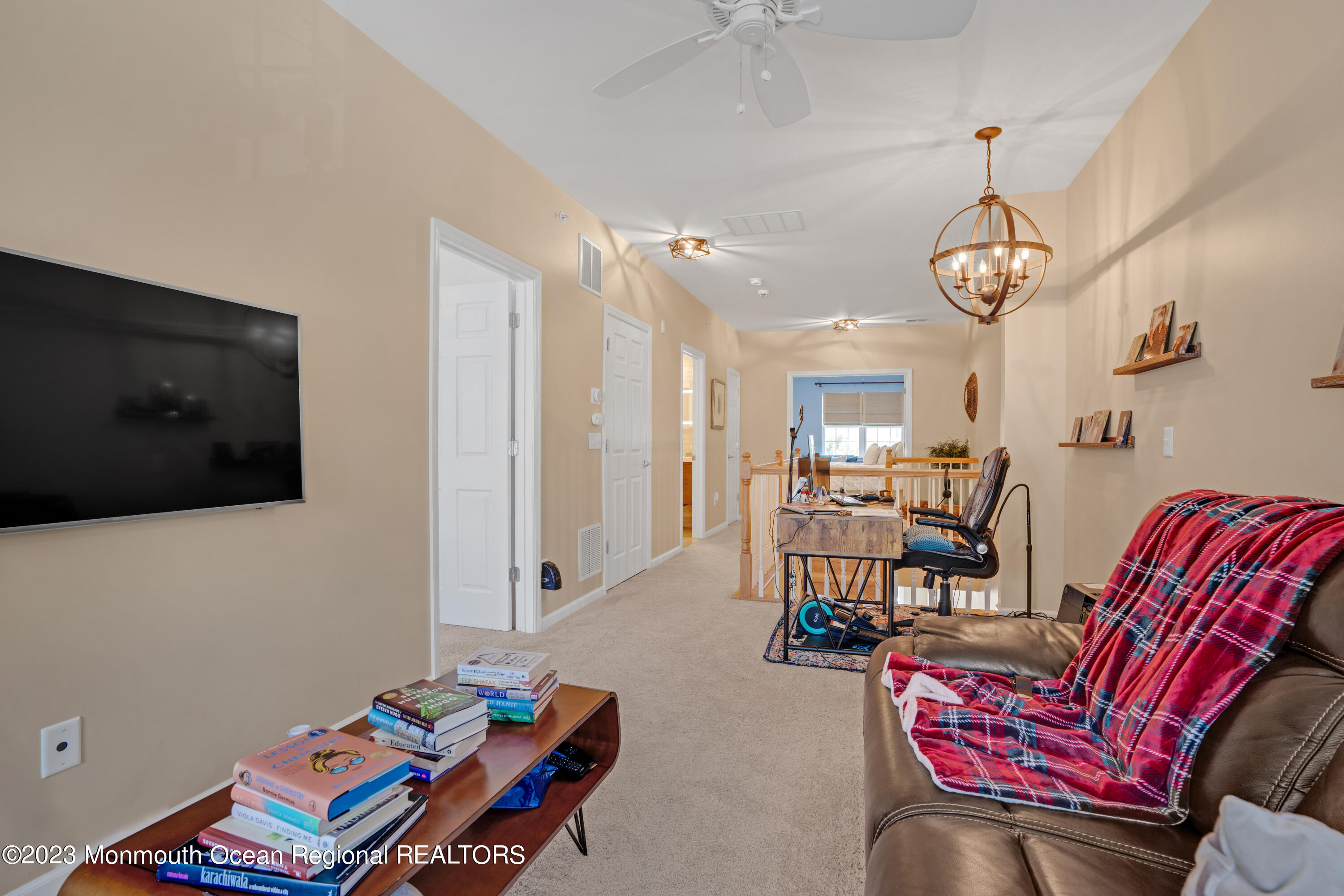 7 Iris Lane, Unit 504 Garfield, NJ 07026 - Photo 17 of 31 a living room with furniture and a flat screen tv