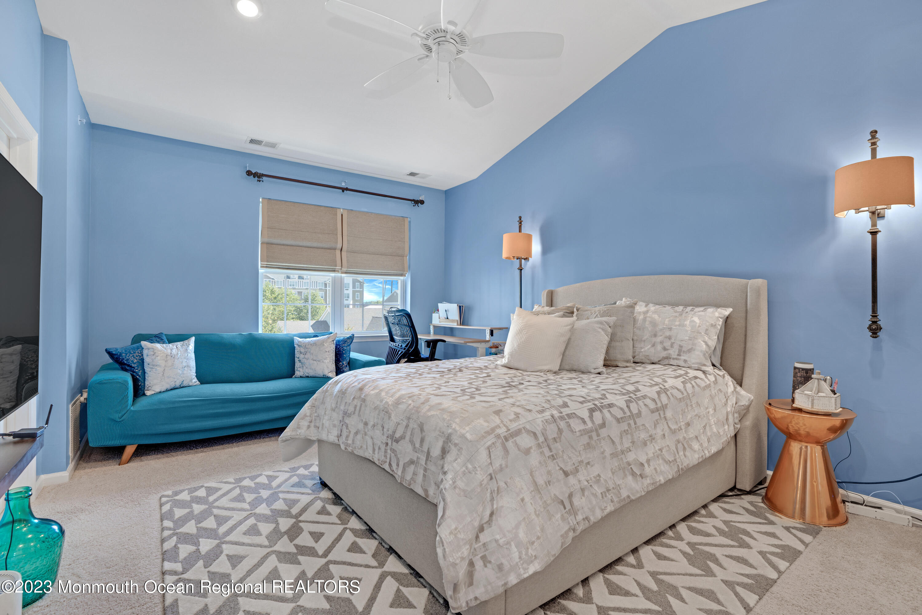 7 Iris Lane, Unit 504 Garfield, NJ 07026 - Photo 18 of 31 a bedroom with a bed and a couch