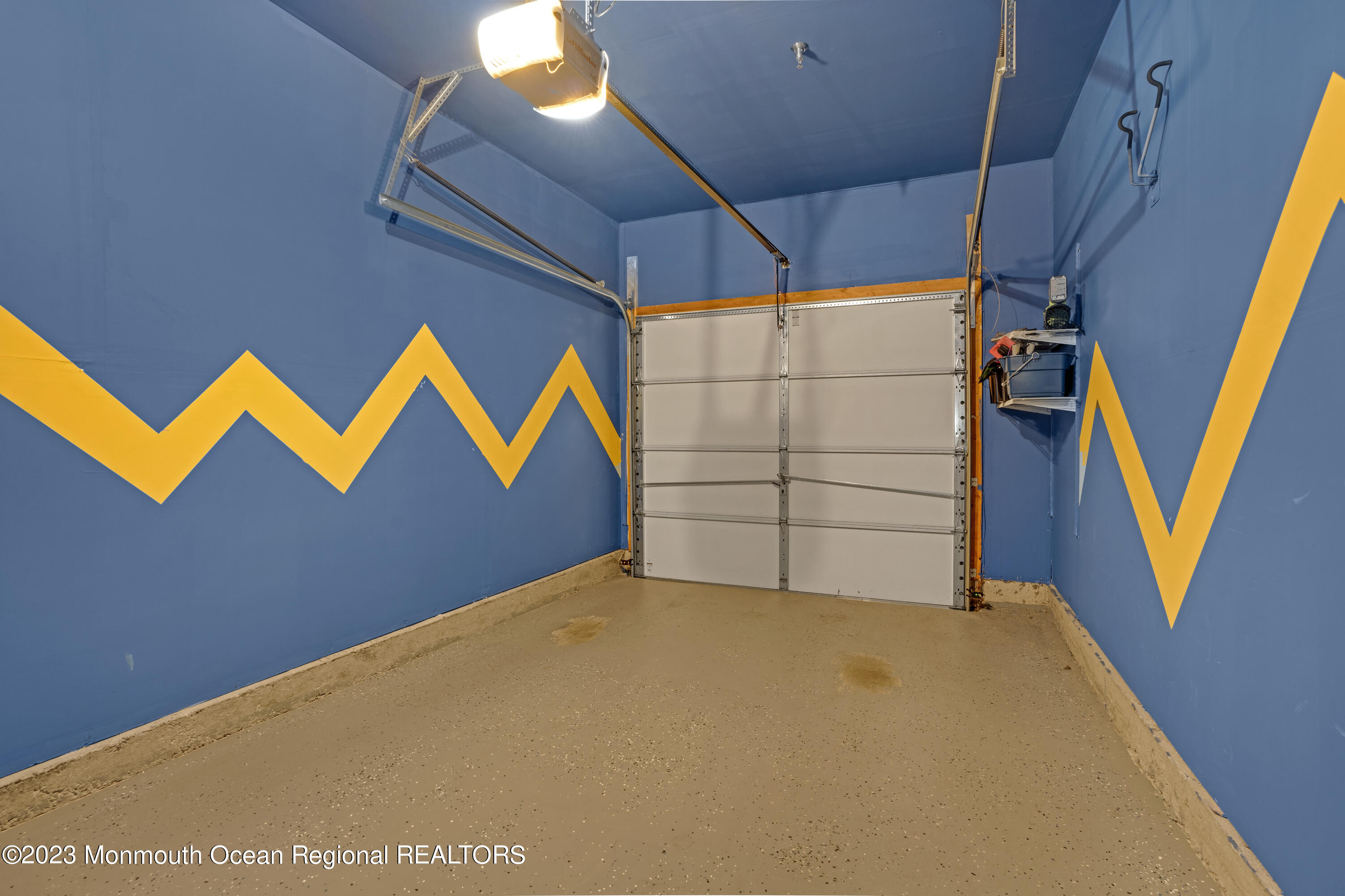 7 Iris Lane, Unit 504 Garfield, NJ 07026 - Photo 28 of 31 a view of a garage