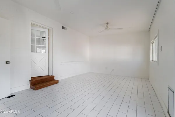 wooden floor and window in a room
