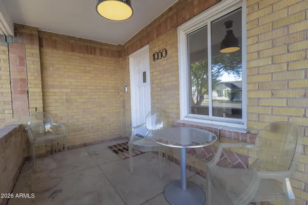 a bathroom with a tub and shower