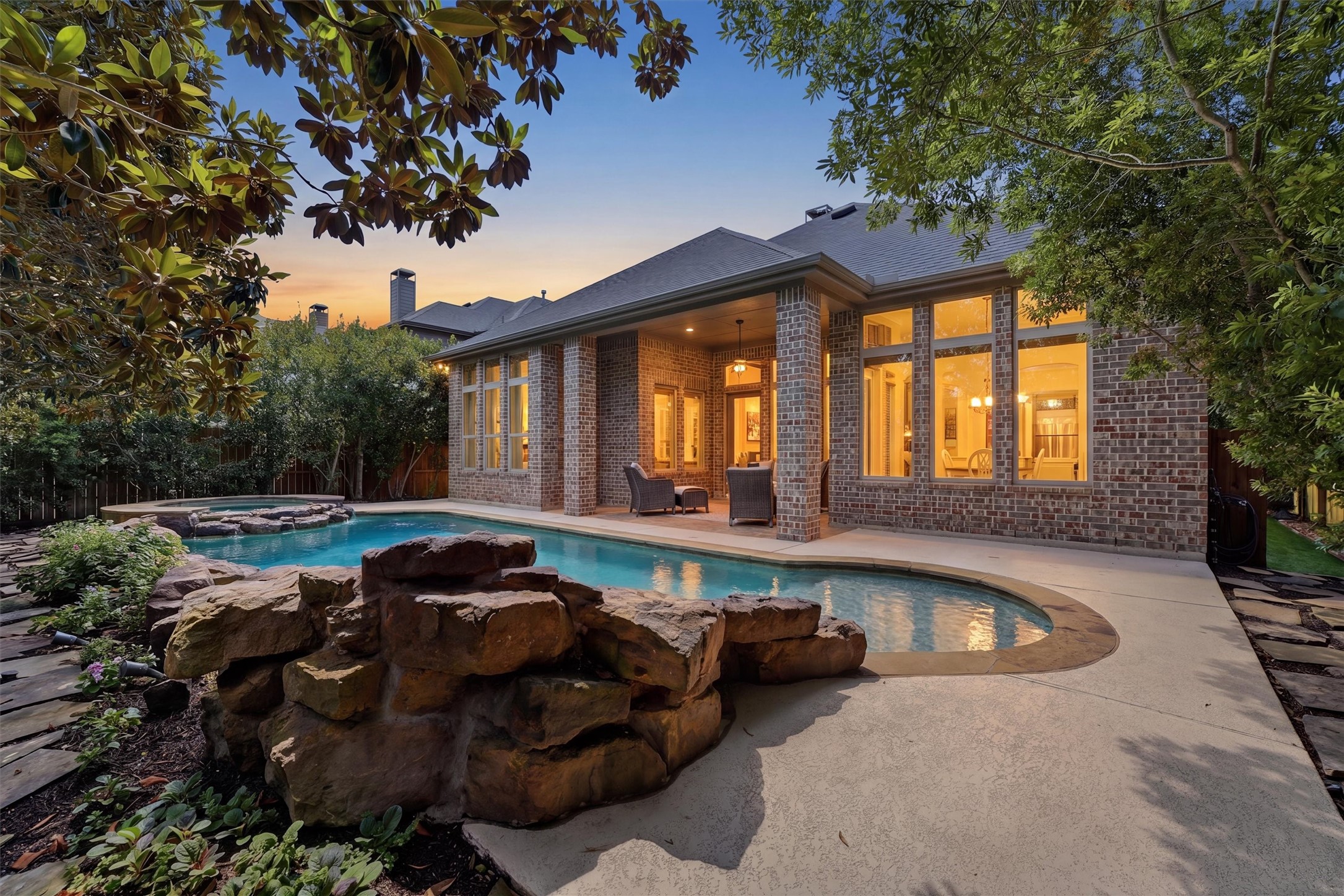 27118 Cross Pointe Court Fulshear, TX 77441 - Photo 2 of 40 Backyard oasis ready for your family! Pool, spa, privacy landscaping